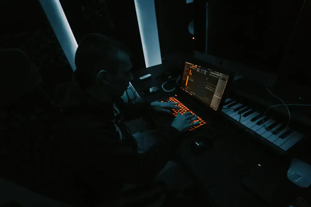 Sound designer working creatively in a recording studio